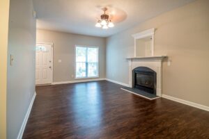 A stylish living room featuring custom hardwood flooring